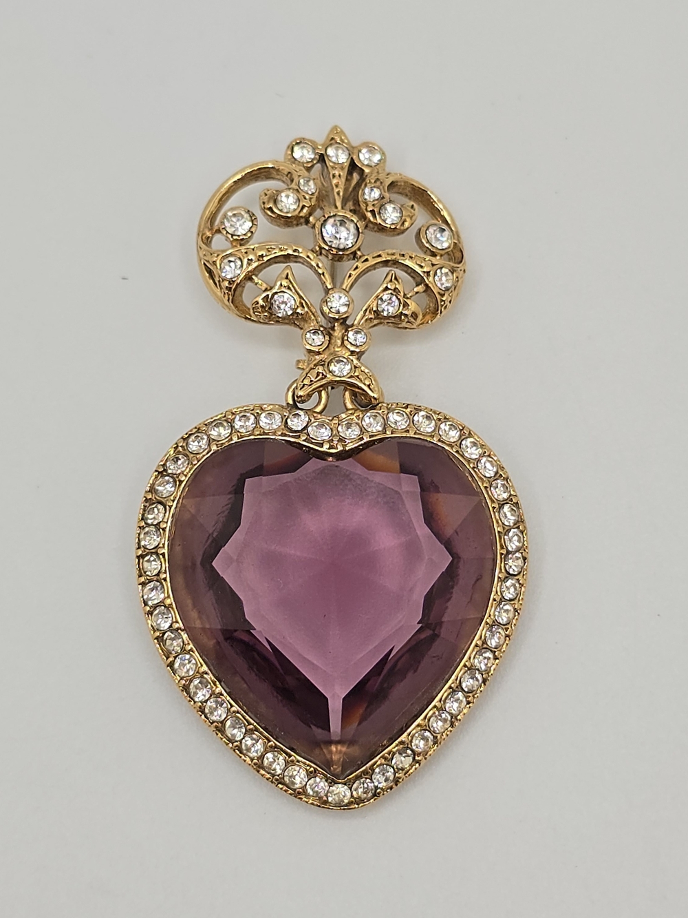 Vintage Purple Crystal Heart Brooch Rhinestone Gold Tone Articulated 2.25"
